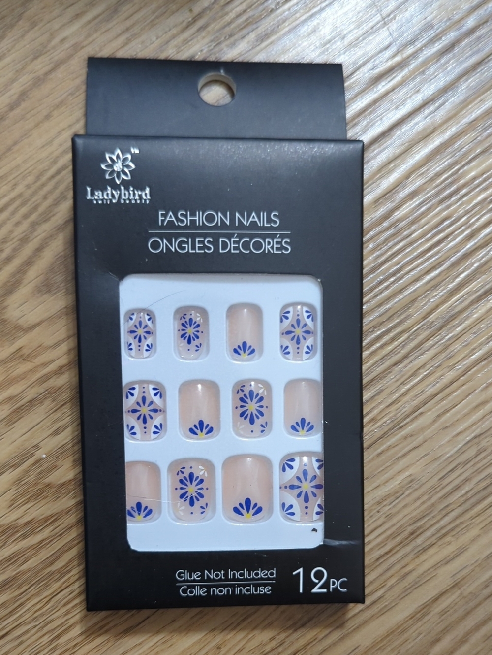 Ladybird Fashion Press-On Nails — Nude Base with Blue Floral Accents